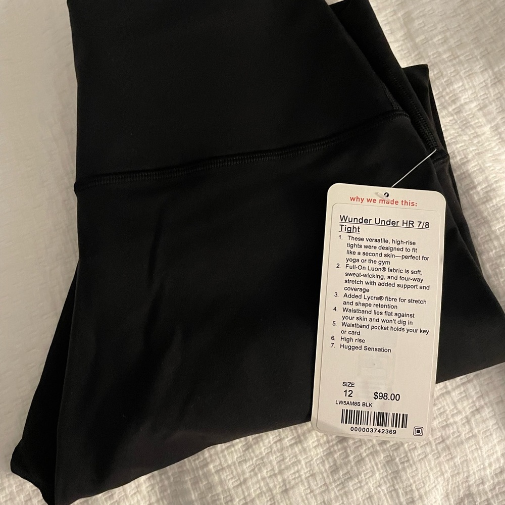 LULULEMON ATHLETICA BLACK LUON LEGGINGS NEW WITH TAGS SIZE 12